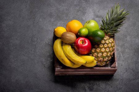 Photo for Wooden box full of healthy fruits food. With copy space - Royalty Free Image