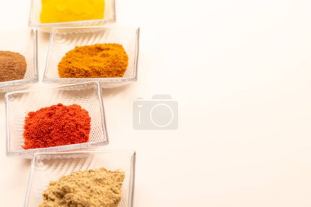 Foto de Various dried spices in small bowls with copy space - Imagen libre de derechos