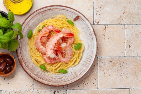 Photo for Pasta with shrimps. Italian cuisine. Flat lay with copy space - Royalty Free Image