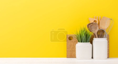 Photo for Kitchen utensils on wooden table. Front view with copy space - Royalty Free Image
