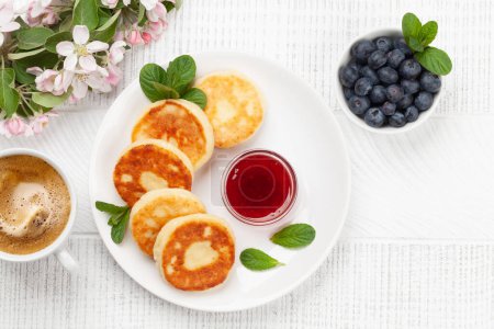 Photo for Cottage pancakes with berries. Breakfast with coffee. Top view flat lay with copy space - Royalty Free Image