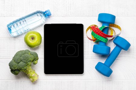 Photo for Fitness and healthy diet concept. Flat lay with tablet for your fitness plan or diet menu - Royalty Free Image