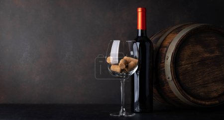 Photo for Red wine bottle, barrel and wine glass with corks. With blank space for your text - Royalty Free Image