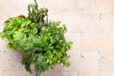 Photo for Various garden herbs on table. Basil, dill, parsley, rosemary. Flat lay with copy space - Royalty Free Image