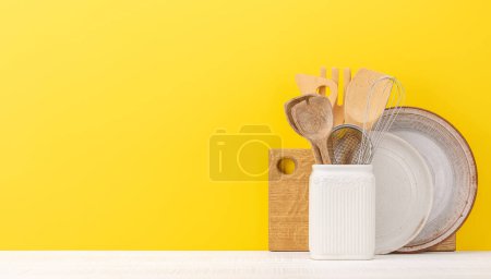 Photo for Kitchen utensils on wooden table. Front view with copy space - Royalty Free Image