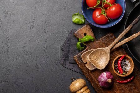 Photo for Top-down view of a kitchen table with ingredients, utensils, and copy space, perfect for creating a mockup for recipes or menus - Royalty Free Image