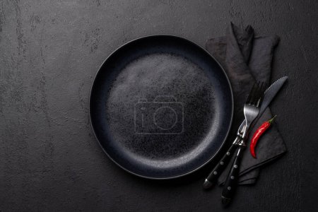 Photo for Top-down view of an empty plate and silverware mockup, perfect for showcasing a meal - Royalty Free Image