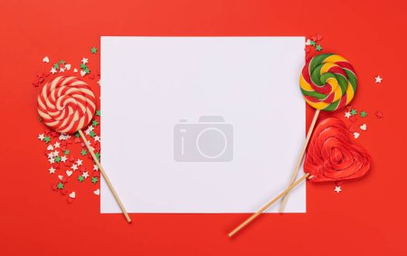 Foto de Candy sweets and blank greeting card for your greetings. Flat lay - Imagen libre de derechos