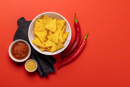 Photo for Mexican food featuring nachos. Flat lay with copy space - Royalty Free Image