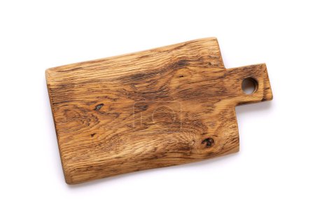Foto de Tabla de cortar de madera. Aislado sobre fondo blanco. Vista superior plana - Imagen libre de derechos