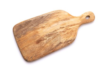 Foto de Wooden cutting board. Isolated on white background. Flat lay top view - Imagen libre de derechos