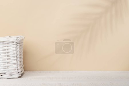 Photo for Body care bathroom towels basket on table with space for your product or text. Spa arrangement - Royalty Free Image