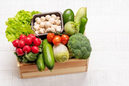 Photo for Wooden boxes full of healthy vegetables food. With copy space - Royalty Free Image