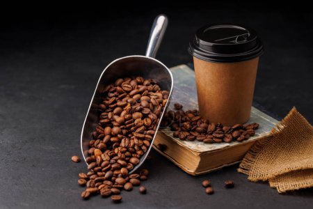 Photo for Aromatic coffee in a paper cup and fresh roasted coffee beans - Royalty Free Image