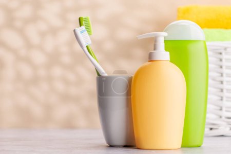 Photo for A clean and refreshing image featuring toiletry tubes and toothbrushes, promoting oral hygiene and a healthy lifestyle - Royalty Free Image