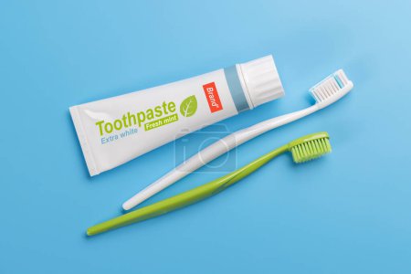 Foto de Una imagen limpia y refrescante con pasta de dientes y cepillos de dientes, que promueve la higiene bucal y una sonrisa brillante. Piso con espacio de copia - Imagen libre de derechos