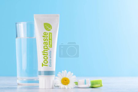 Photo for A clean and refreshing image featuring toothpaste and toothbrushes, promoting oral hygiene and a bright smile - Royalty Free Image