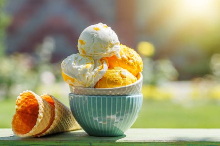 Photo for Refreshing ice cream treats with a hint of zesty lemon flavour and waffle cones - Royalty Free Image