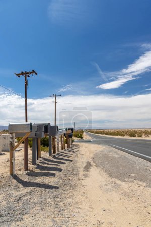 Photo for Many mailboxes along the road, representing the sense of community and connection through communication and correspondence - Royalty Free Image