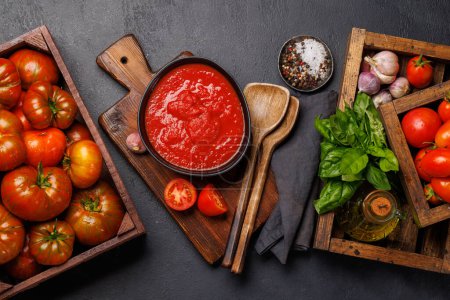 Photo for Rich homemade tomato sauce and ingredients. Flat lay - Royalty Free Image