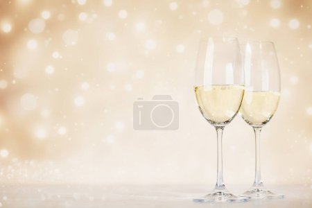 Photo for Two champagne glasses. Christmas greeting card template with copy space - Royalty Free Image
