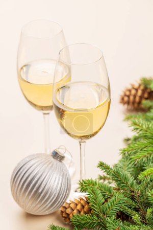 Photo for Xmas fir tree branch, champagne and bauble decor - Royalty Free Image