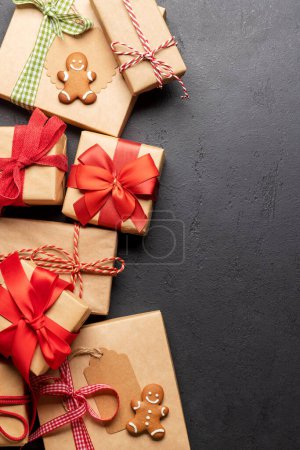 Photo for Christmas gift boxes, gingerbread cookies and space for greetings text. Flat lay - Royalty Free Image