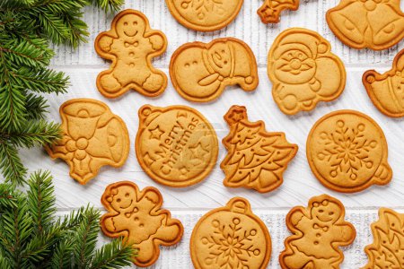 Photo for Diverse Christmas gingerbread cookies, festive sweetness. Flat lay - Royalty Free Image