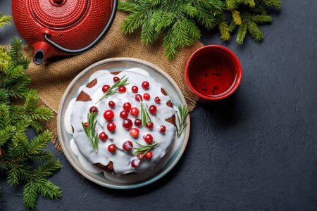 Photo for Delicious Christmas cake, a festive holiday treat. Flat lay with copy space - Royalty Free Image