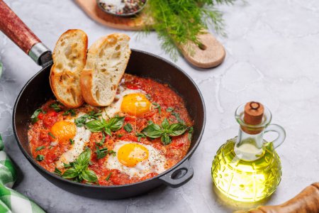Photo for Delicious shakshuka breakfast in a frying pan - Royalty Free Image