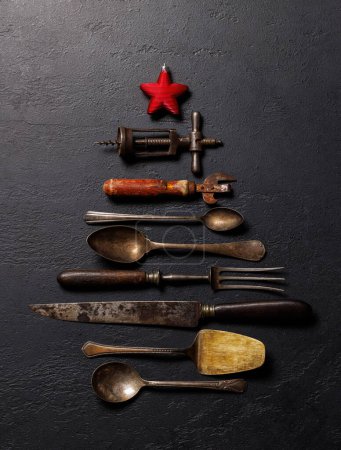 Photo for Festive culinary flair: Christmas tree-shaped cooking utensils. Flat lay with - Royalty Free Image