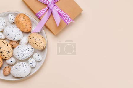Photo for Easter delights: Colorful eggs in a festive arrangement and gift box. Flat lay with card copy space - Royalty Free Image