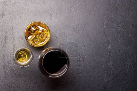 Photo for Whiskey, wine, champagne drinks, elegant and enticing. Flat lay with copy space - Royalty Free Image