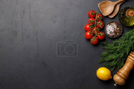 Photo for Cooking scene: Cherry tomatoes, herbs and spices on table. Flat lay with copy space - Royalty Free Image