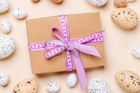 Photo for Easter delights: Colorful eggs in a festive arrangement and gift box. Flat lay - Royalty Free Image