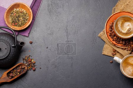 A tantalizing display of roasted coffee beans and dry tea leaves, accompanied by an espresso coffee cup and a teapot. Flat lay with copy space