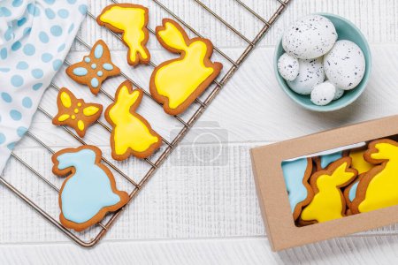 Photo for Easter sweetness: Adorable gingerbread cookies in festive shapes. Flat lay - Royalty Free Image