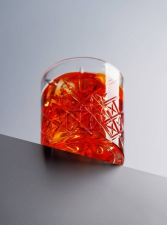 Cocktail delight: Classic negroni against a grey background with copy space