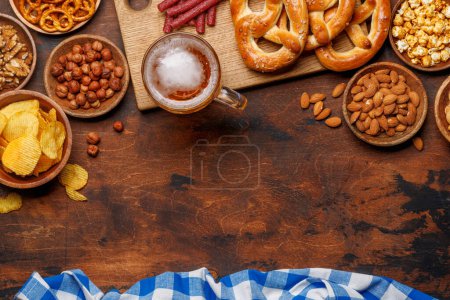 Photo for Assorted Beer Stands: chips, nuts, pretzels. Diverse Options for Refreshment flat lay with copy space - Royalty Free Image