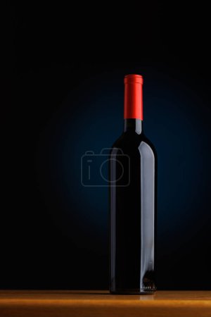 Wine sophistication: Bottle elegantly displayed on a bar table