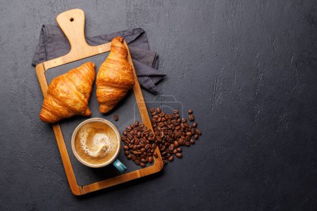Photo for Cappuccino coffee and fresh croissants on stone table. Flat lay with copy space - Royalty Free Image
