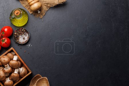 Photo for Spices, olive oil, ingredients and utensils on cooking table. Flat lay with copy space - Royalty Free Image