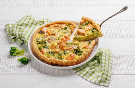 Fresh fish homemade pie with salmon and broccoli