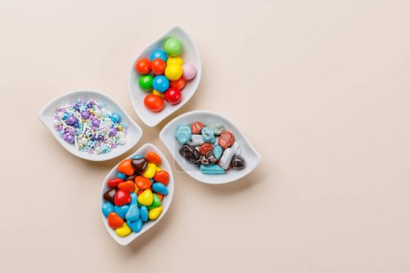 Photo for Various colorful candies, lollipops. Flat lay with copy space - Royalty Free Image