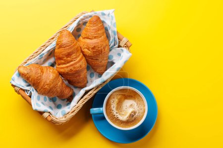 Photo for Cappuccino coffee and fresh croissants. Flat lay with copy space - Royalty Free Image
