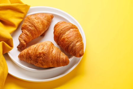 Photo for Fresh croissants on plate. With copy space - Royalty Free Image