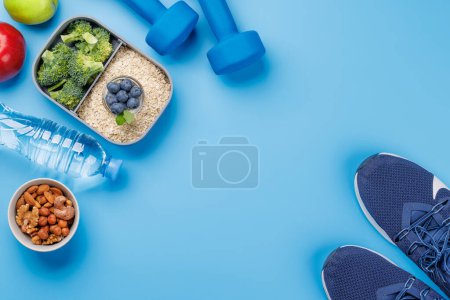 Photo for Healthy food and fitness items. Flat lay with copy space - Royalty Free Image
