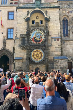 Photo for Prague, Czech Republic - June 13, 2022: People around the Prague Astronomical Clock waiting for the every hour medieval clocks show, Old Town Square in Prague, Czech Republic. - Royalty Free Image