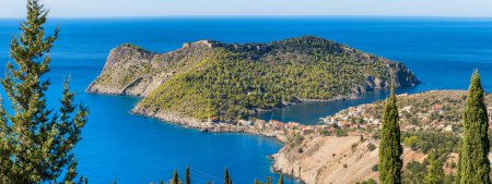 Photo for Panorama view of beautiful and picturesque colorful traditional fishing village of Assos on Cefalonia island, Ionian sea, Greece. Peninsula of Assos in Kefalonia, Greece - Royalty Free Image