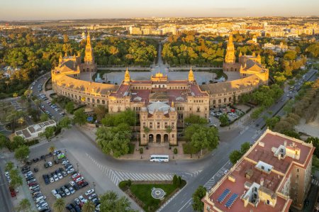 Photo for Plaza de Espana at sunrise in Seville, Spain. Aerial drone photo of the famous Spanish Square and Maria Luisa park in the morning in Seville. Beautiful light over historic Spanish square in Andalusia - Royalty Free Image
